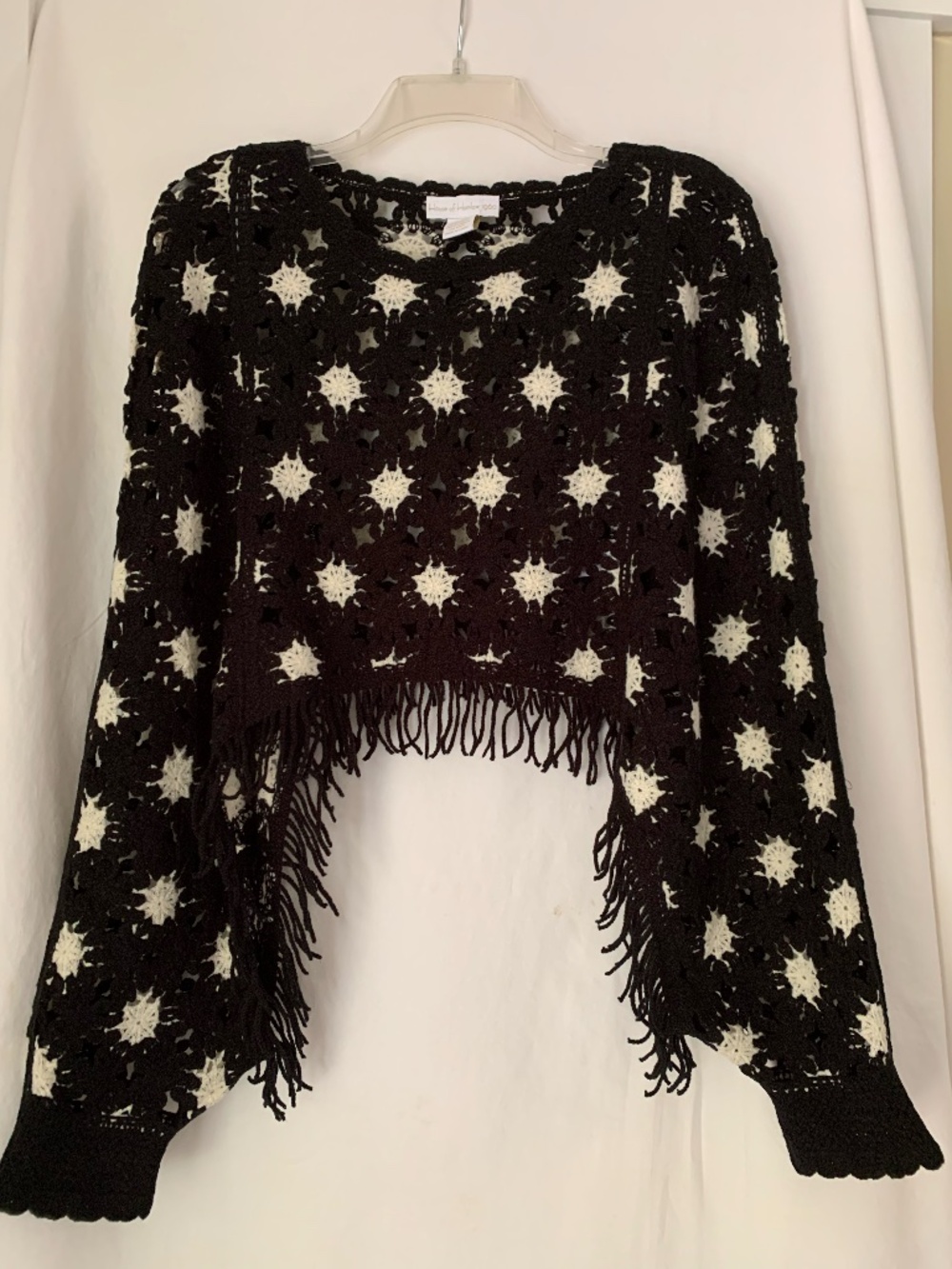 House of Harlow 1960 black & white crochet sweater with fringe lined hem